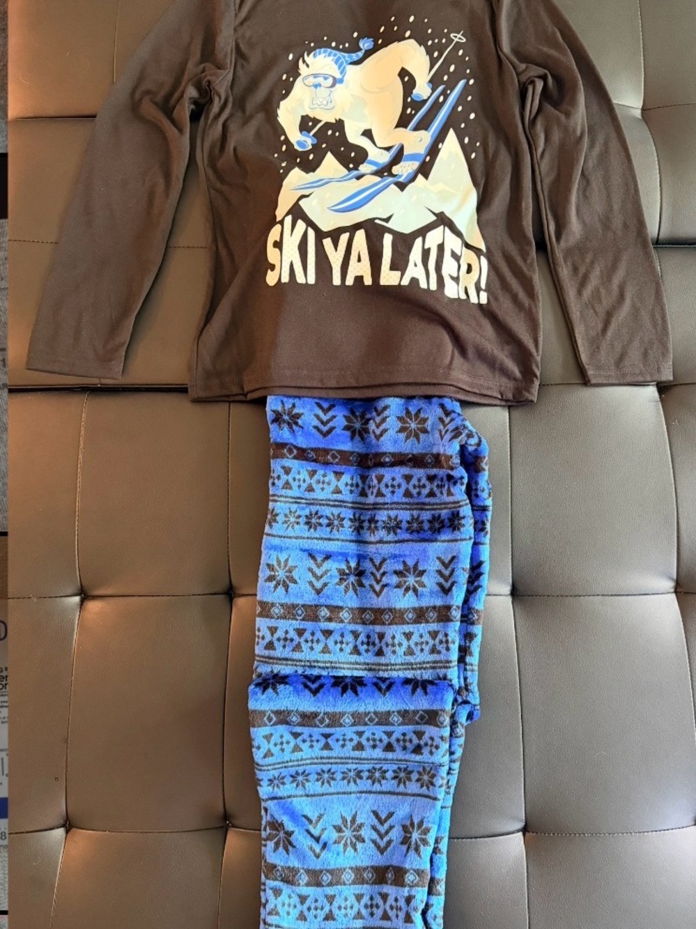 Black and blue 'Ski Ya Later!' Graphic Top with Blue Patterned Pants